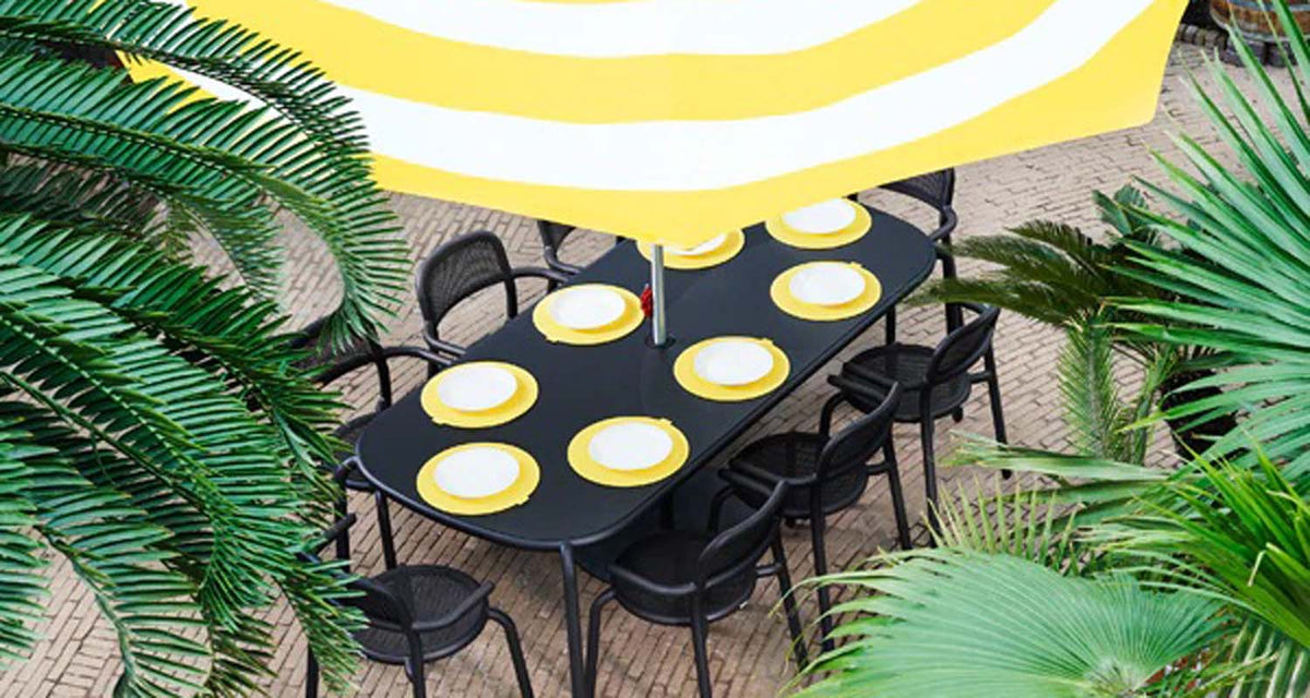 Toni Tablo Outdoor Dining Table by Fatboy, showing toni tablo outdoor dining table in live shot.