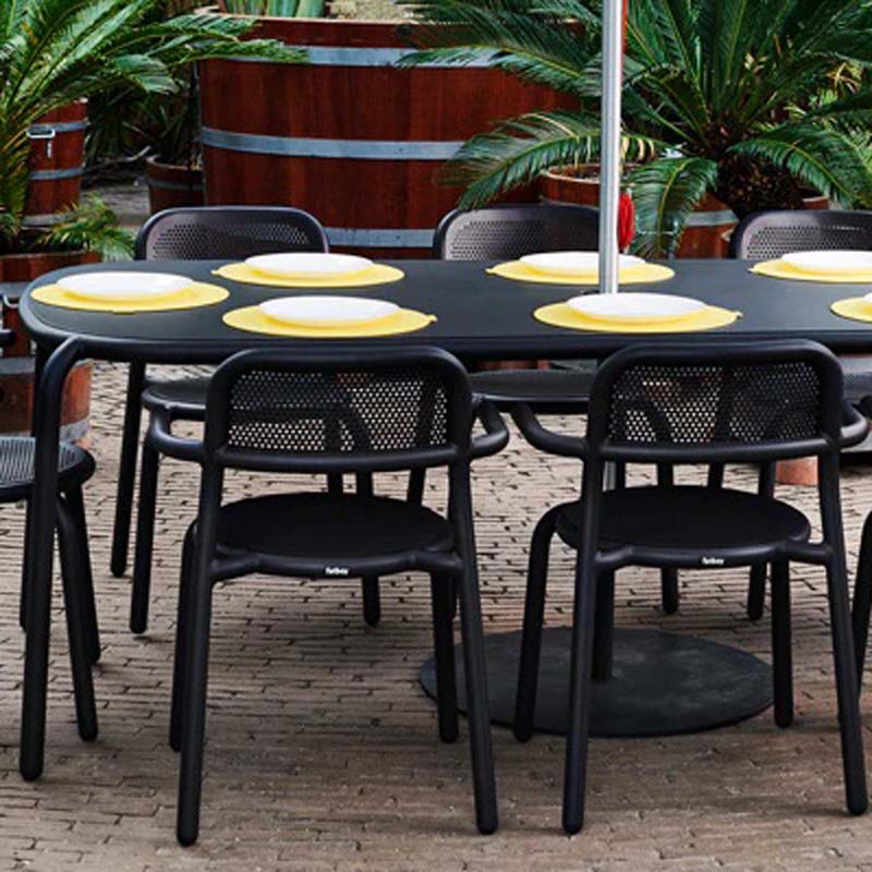 Toni Tablo Outdoor Dining Table by Fatboy, showing toni tablo outdoor dining table in live shot.