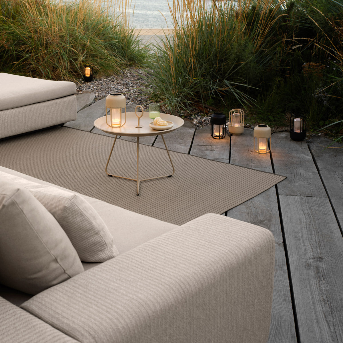 Field Outdoor Rug by Houe, showing field closeup view of outdoor rug in live shot.