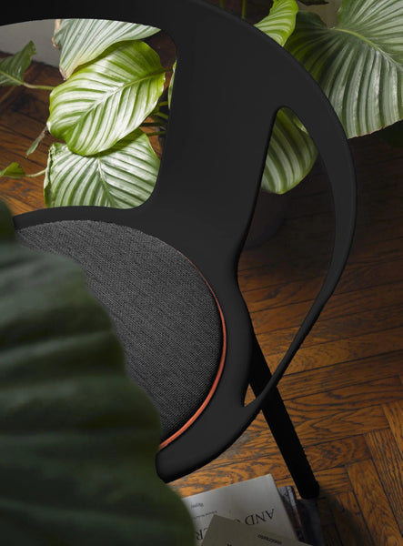 Fla Chair by Toou, showing closeup view of fla chair in live shot.