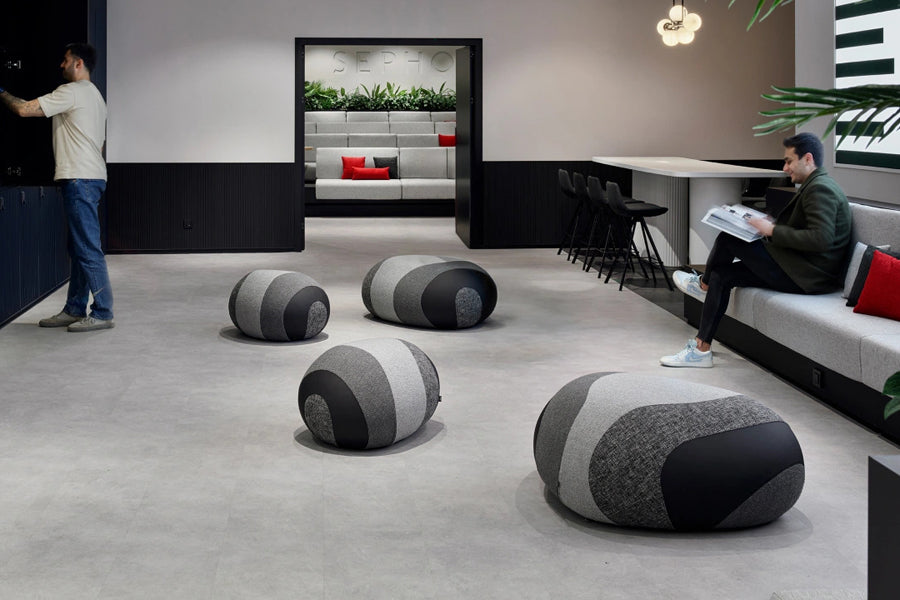 Flint Pouf by B&T, showing flint pouffes in live shot.