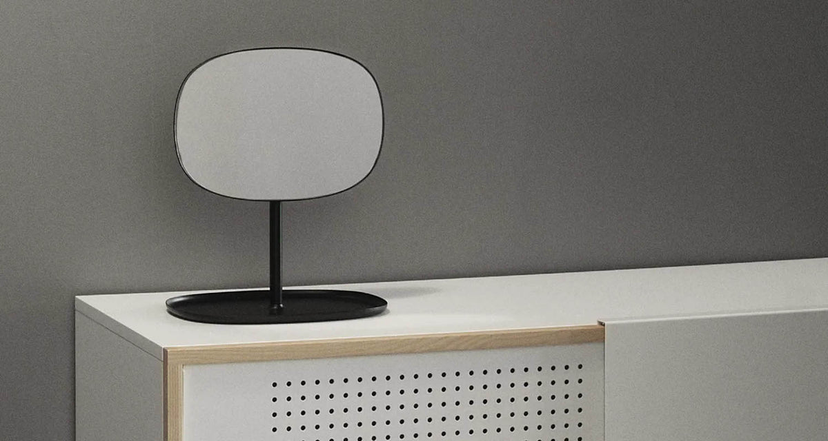 Flip Mirror by Normann Copenhagen, showing flip mirror in live shot.