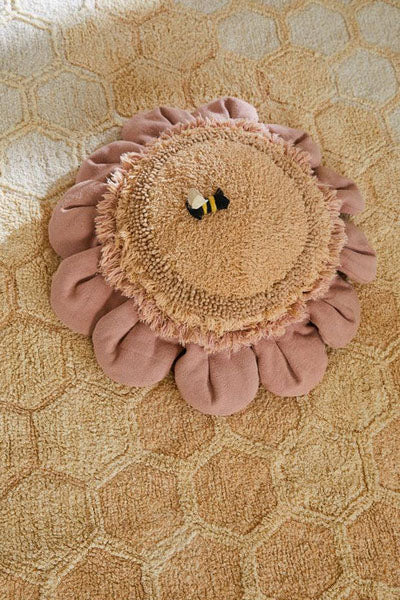 Planet Bee Floor Cushion by Lorena Canals, showing planet bee floor cushion in live shot.