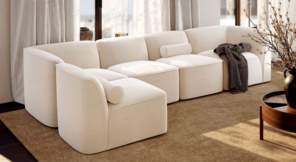Flora Sofa by Woud, showing flora sectional in live shot.