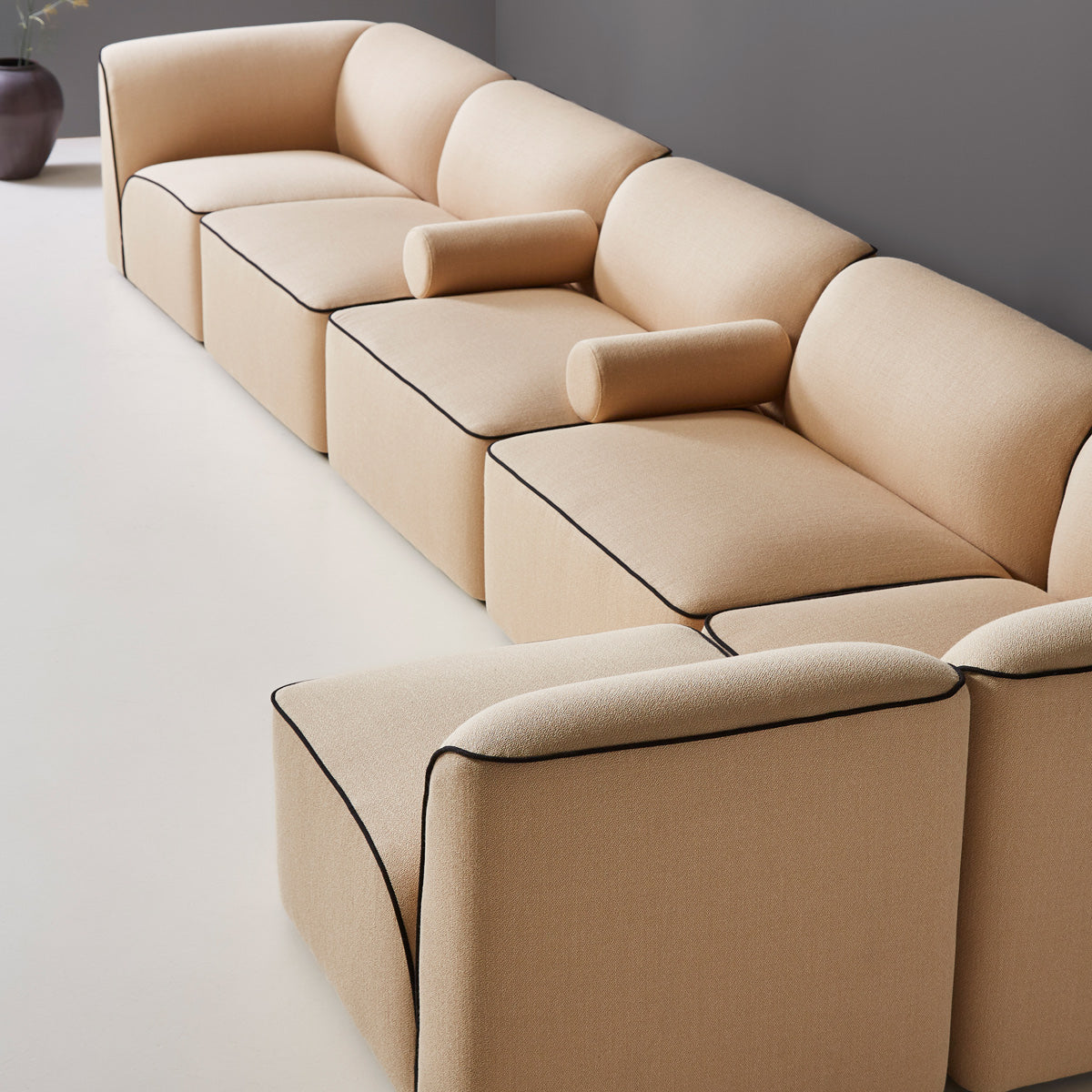 Flora Sofa by Woud, showing closeup view of flora sectional in live shot.