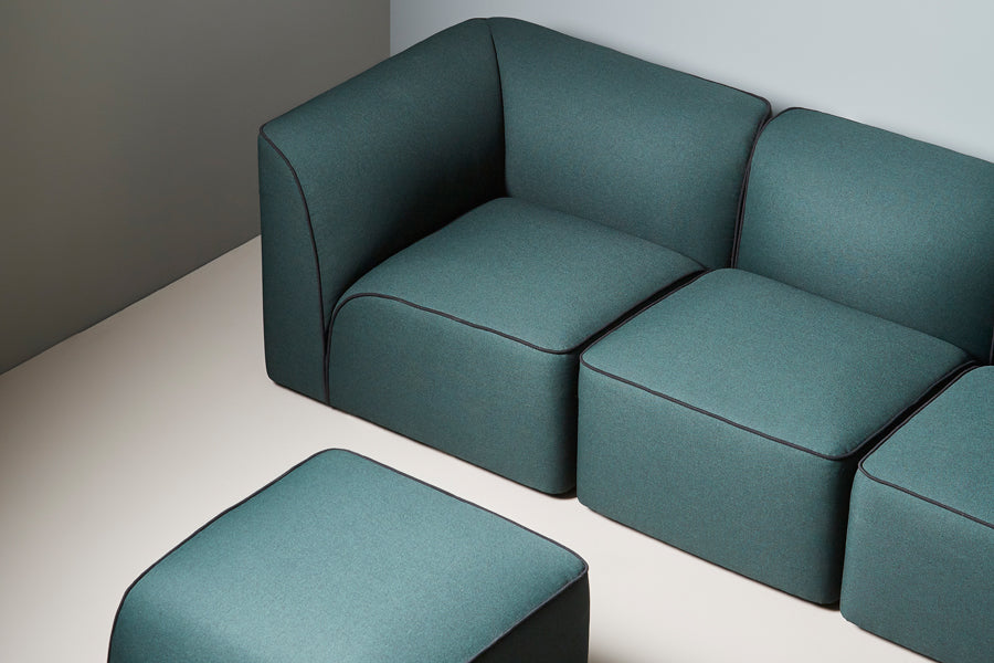 Flora Sofa by Woud, showing closeup view of flora sofa in live shot.