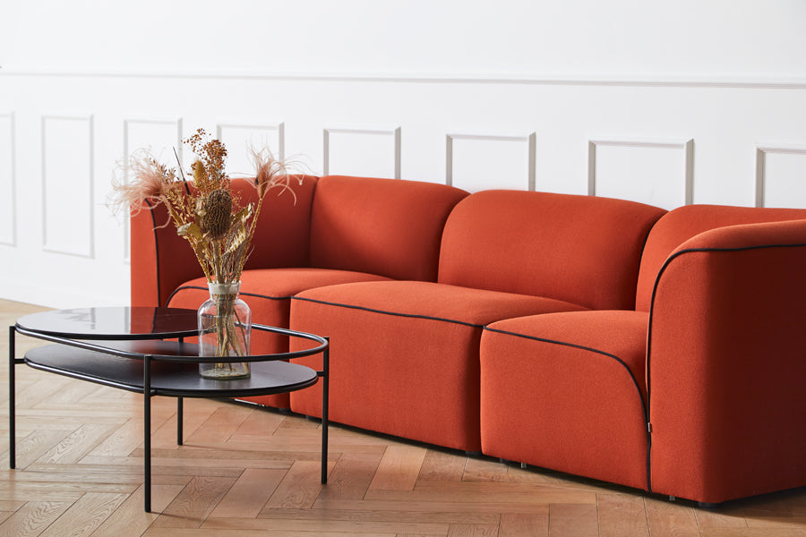 Flora Sofa by Woud, showing closeup view of flora sofa in live shot.