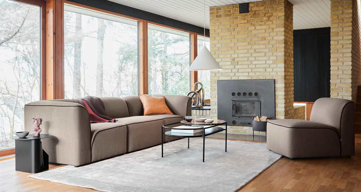 Flora Sofa by Woud, showing flora sofa in live shot.