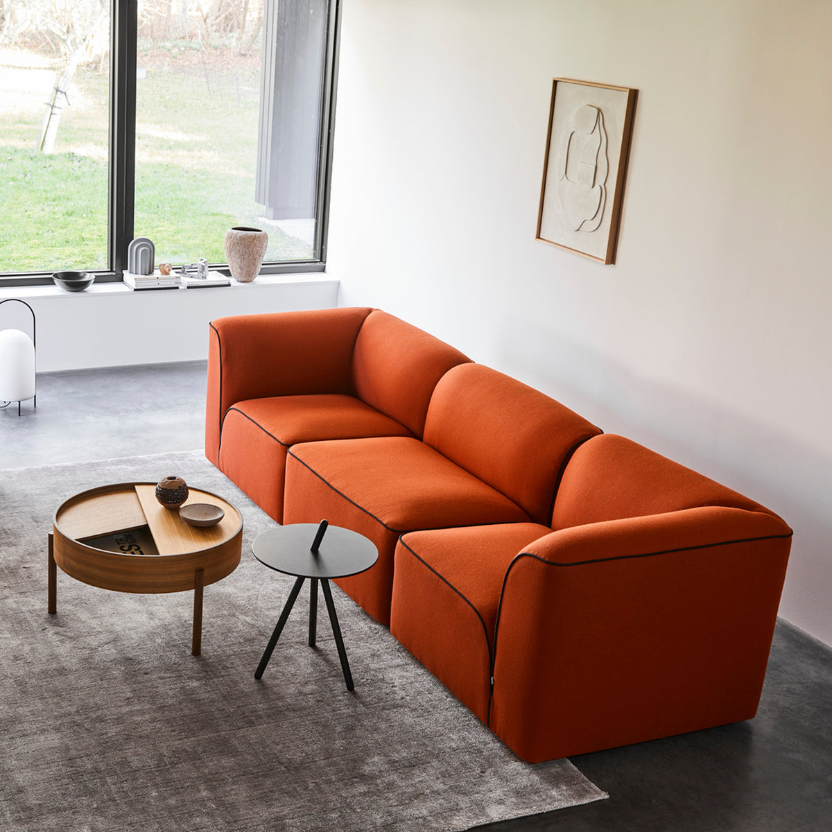 Flora Sofa by Woud, showing flora sofa in live shot.