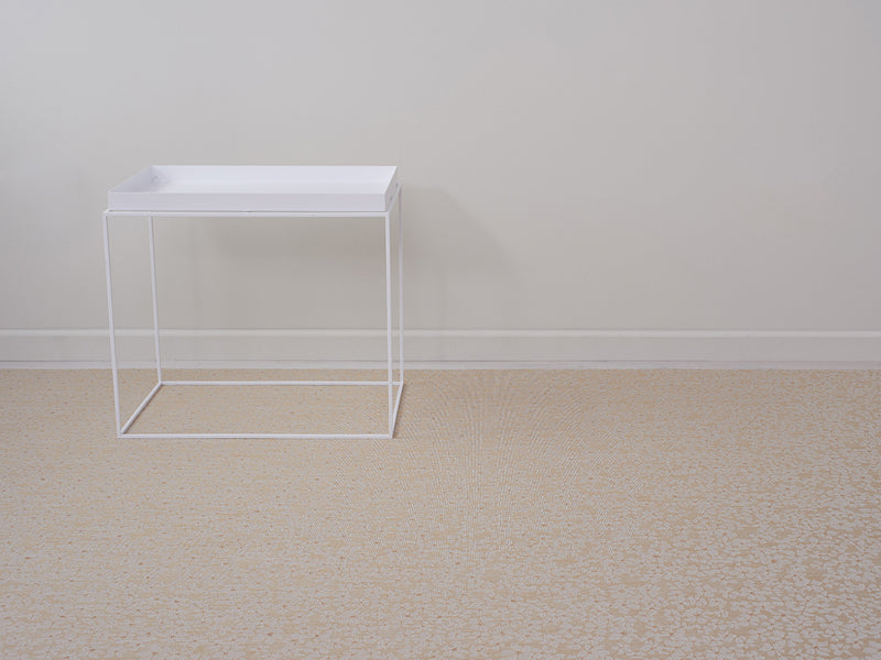 Flora Woven Floor Mat by Chilewich, showing closeup view of flora woven floor mat in live shot.