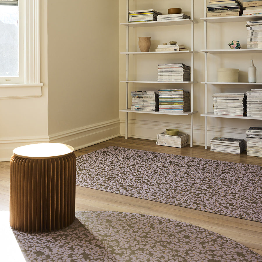 Flora Woven Floor Mat by Chilewich, showing closeup view of flora woven floor mat in live shot.
