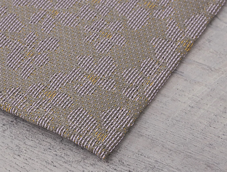 Flora Woven Floor Mat by Chilewich, showing closeup view of flora woven floor mat in live shot.