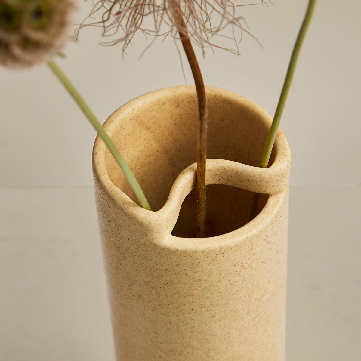 Flowr Vase by Woud, showing closeup view of flowr vase in live shot.