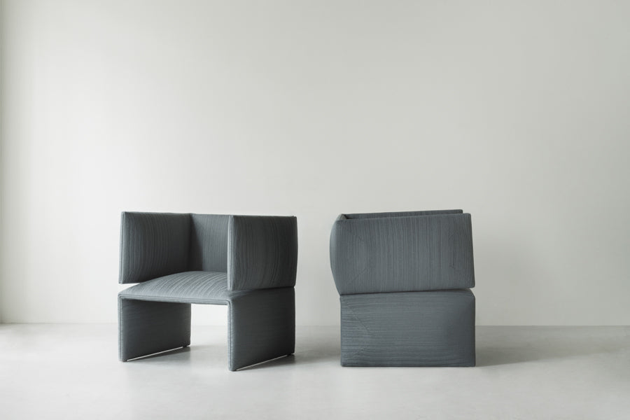 Fold Lounge Chair by Normann Copenhagen, showing fold lounge chairs in live shot.