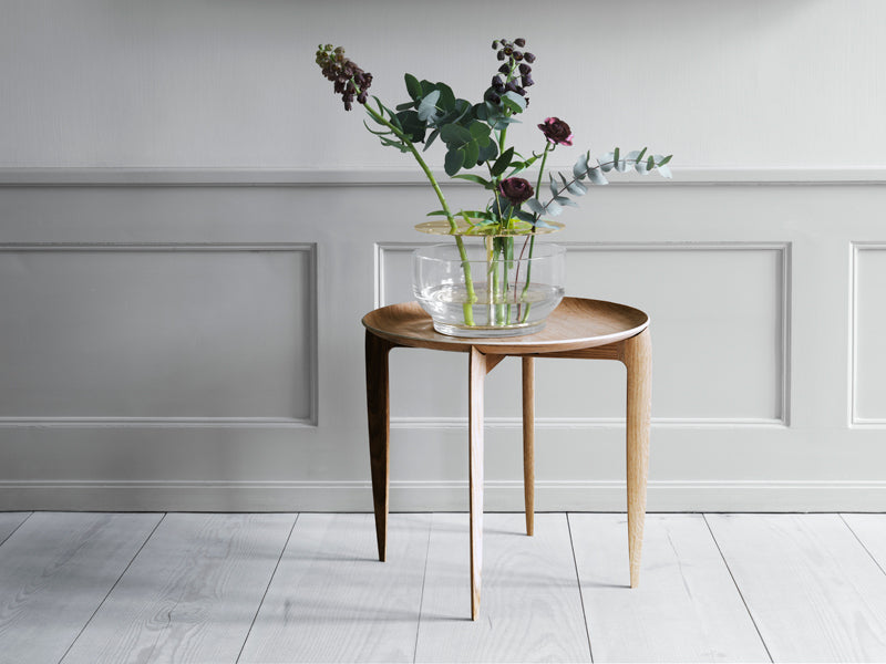 Foldable Tray Table by Fritz Hansen, showing foldable tray table in live shot.