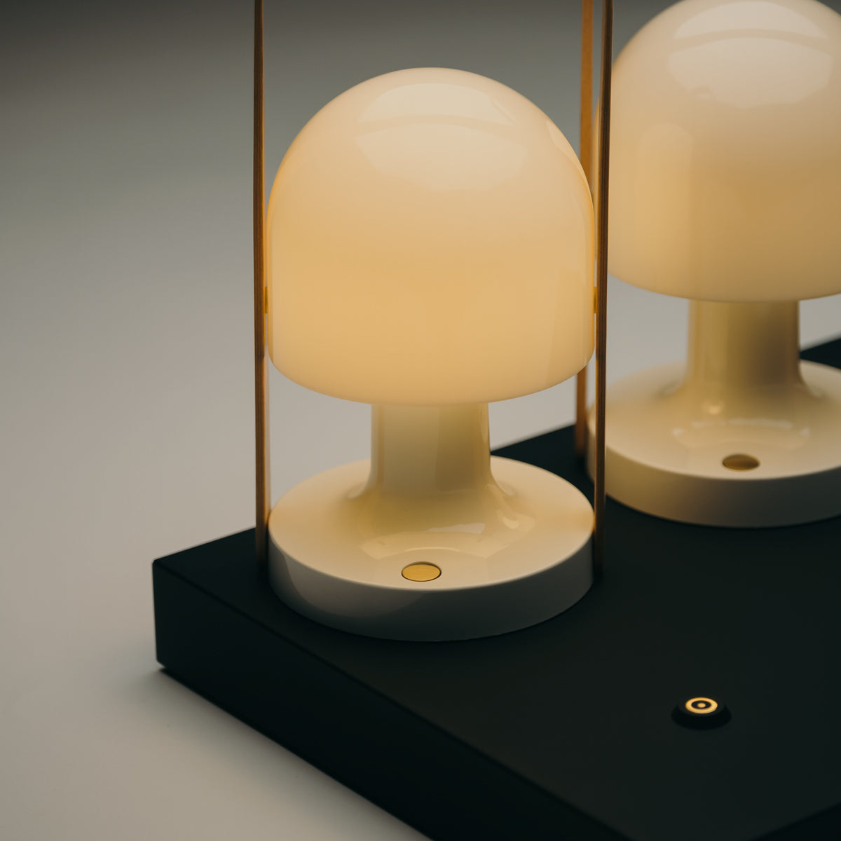 FollowMe Portable Lamp by Marset, showing closeup view of followme portable lamps in live shot.