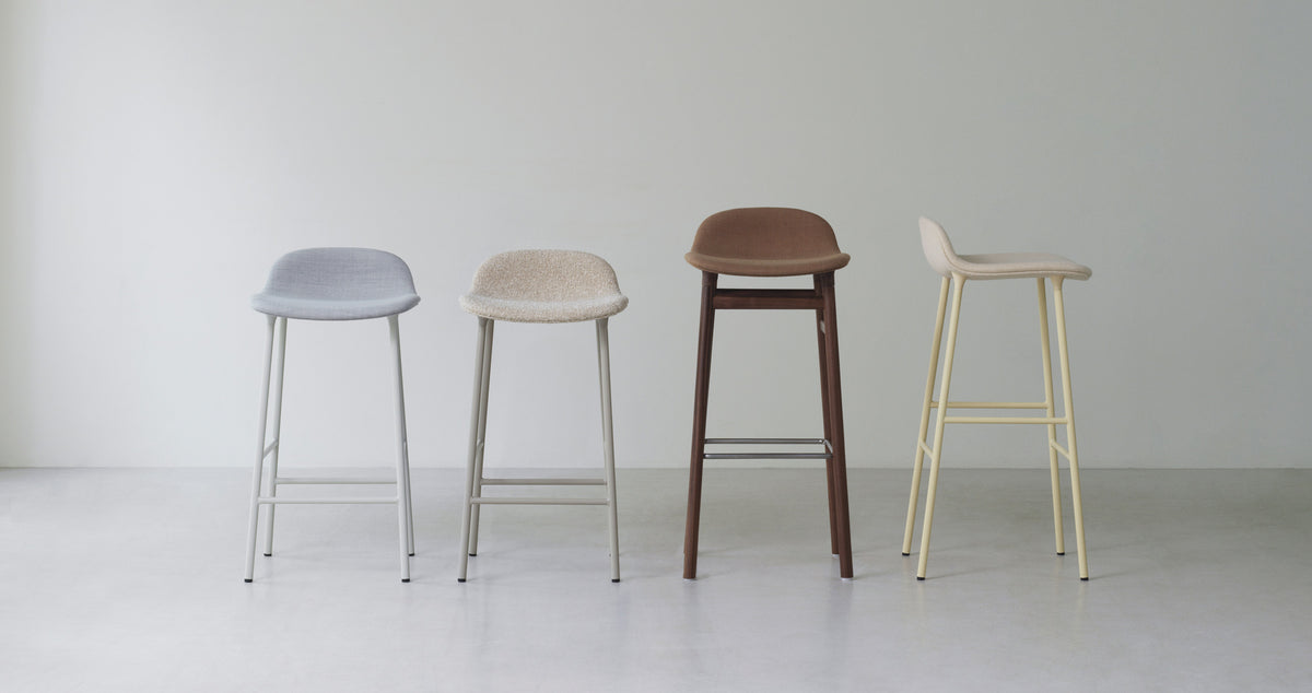 Form 30" High Full Upholstery Steel Barstool by Normann Copenhagen, showing form 30" high full upholstery steel barstools in live shot.