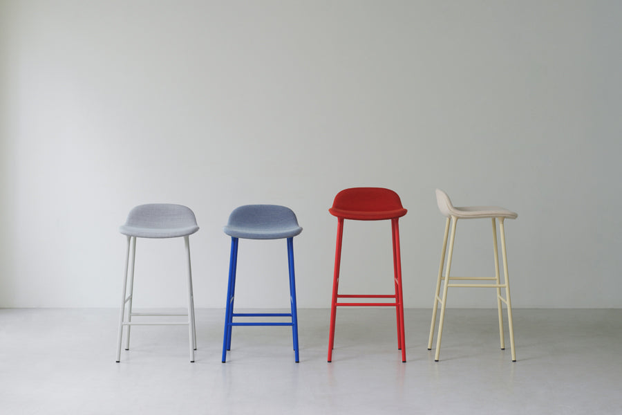 Form 30" High Full Upholstery Steel Barstool by Normann Copenhagen, showing form 30" high full upholstery steel barstools in live shot.