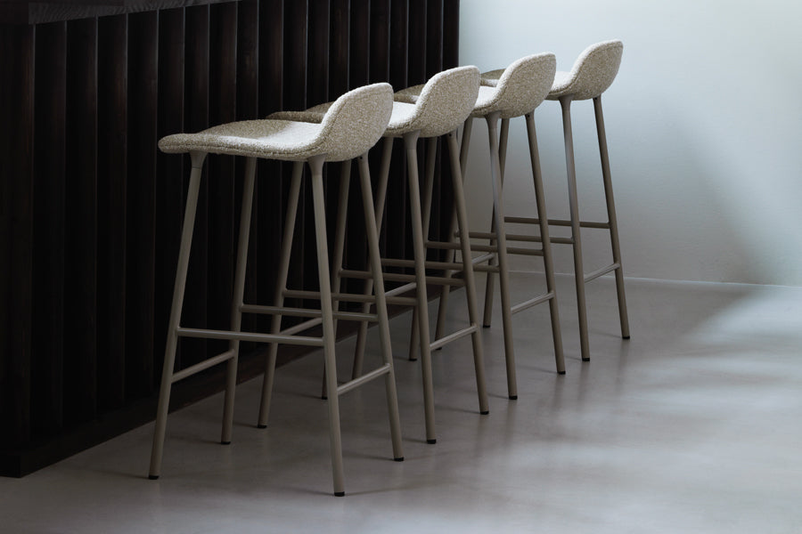 Form 30" High Full Upholstery Steel Barstool by Normann Copenhagen, showing form 30" high full upholstery steel barstools in live shot.