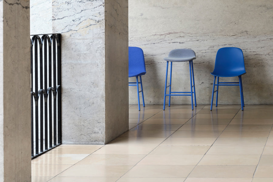 Form 30" High Full Upholstery Steel Barstool by Normann Copenhagen, showing form 30" high full upholstery steel barstool in live shot.