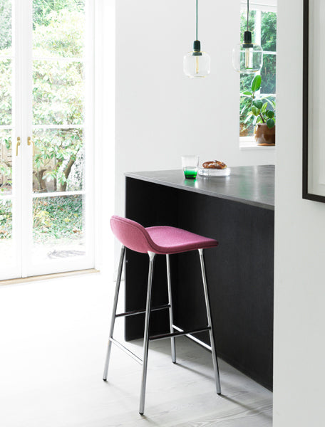 Form 30" High Full Upholstery Steel Barstool by Normann Copenhagen, showing form 30" high full upholstery steel barstool in live shot.