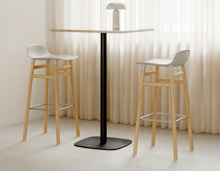 Form 34" High Barstool by Normann Copenhagen, showing form 34" high barstools in live shot.