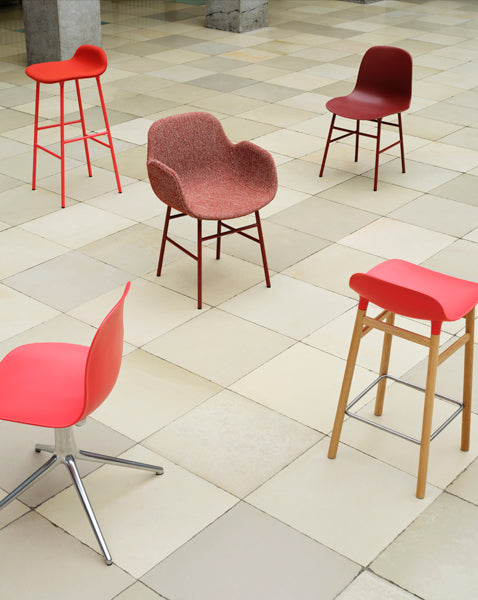 Form 34" High Full Upholstery Steel Barstool by Normann Copenhagen, showing form 34" high full upholstery steel barstool in live shot.