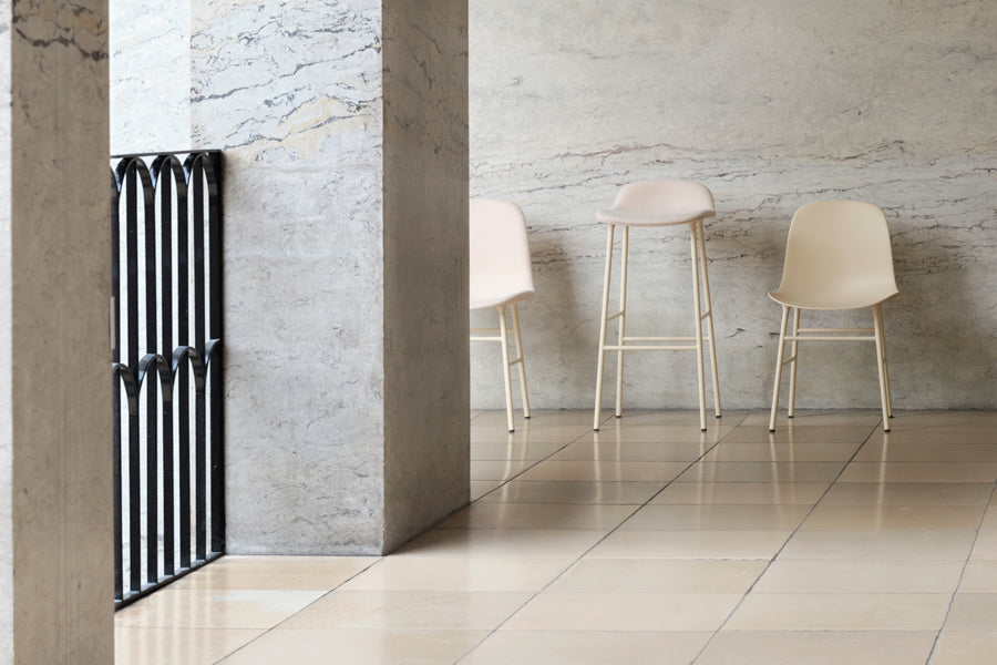 Form 34" High Full Upholstery Steel Barstool by Normann Copenhagen, showing form 34" high full upholstery steel barstool in live shot.
