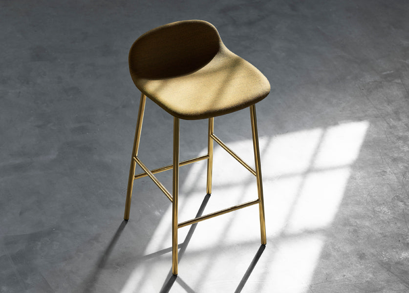Form 34" High Full Upholstery Steel Barstool by Normann Copenhagen, showing form 34" high full upholstery steel barstool in live shot.