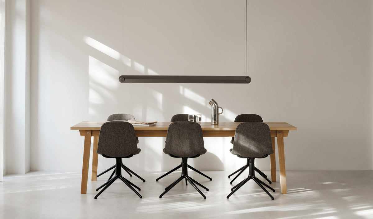 Form Full Upholstery Swivel Chair by Normann Copenhagen, showing form full upholstery swivel chairs in live shot.