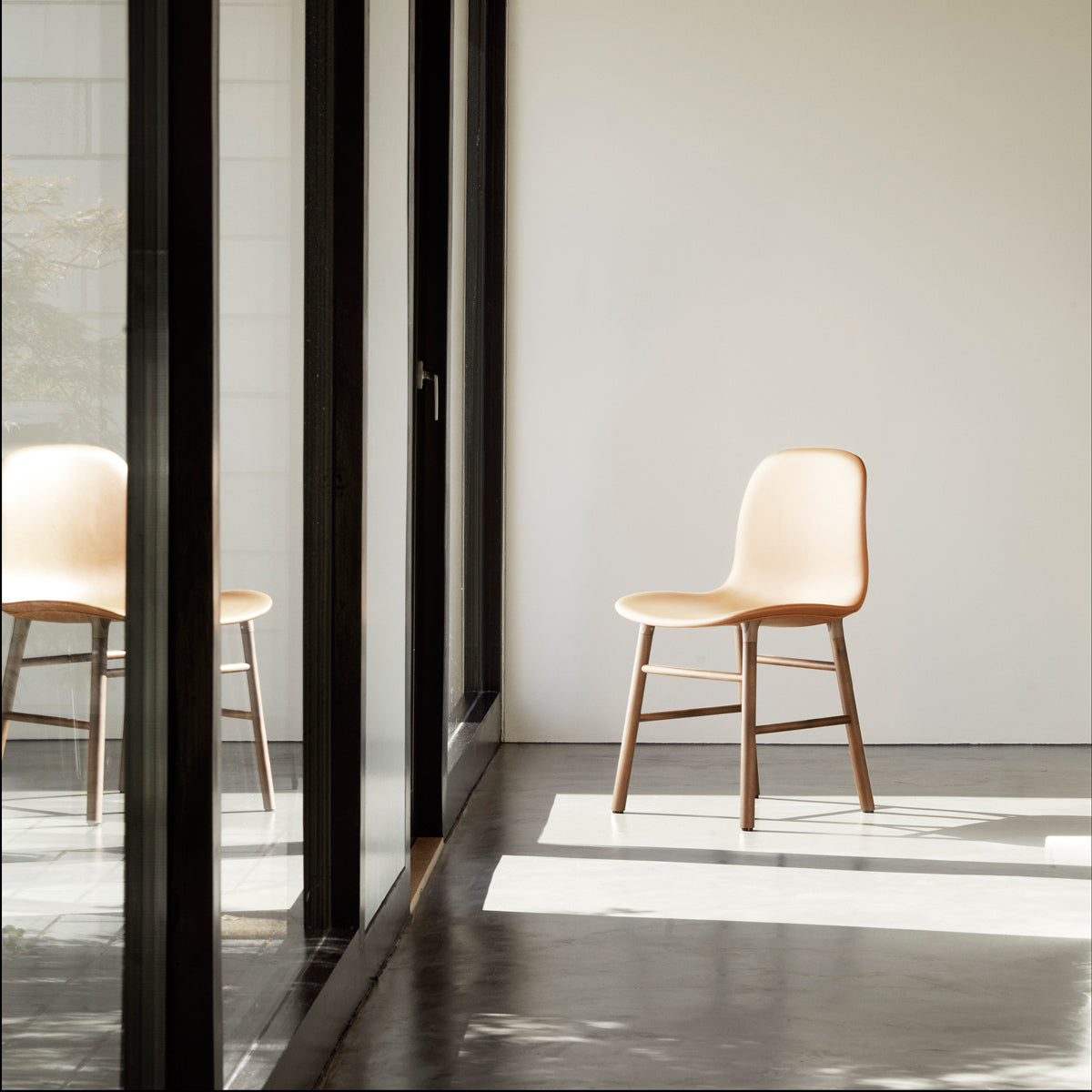 Form Full Upholstery Wood Chair by Normann Copenhagen, showing form full upholstery wood chair in live shot.