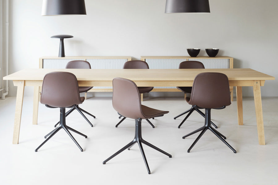Form Swivel Chair by Normann Copenhagen, showing form swivel chairs in live shot.