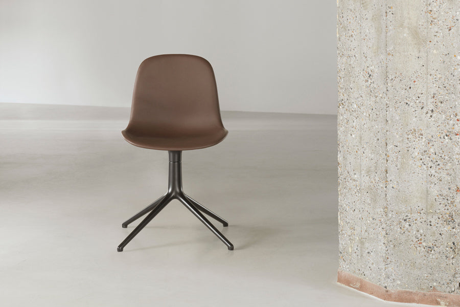 Form Swivel Chair by Normann Copenhagen, showing form swivel chair in live shot.