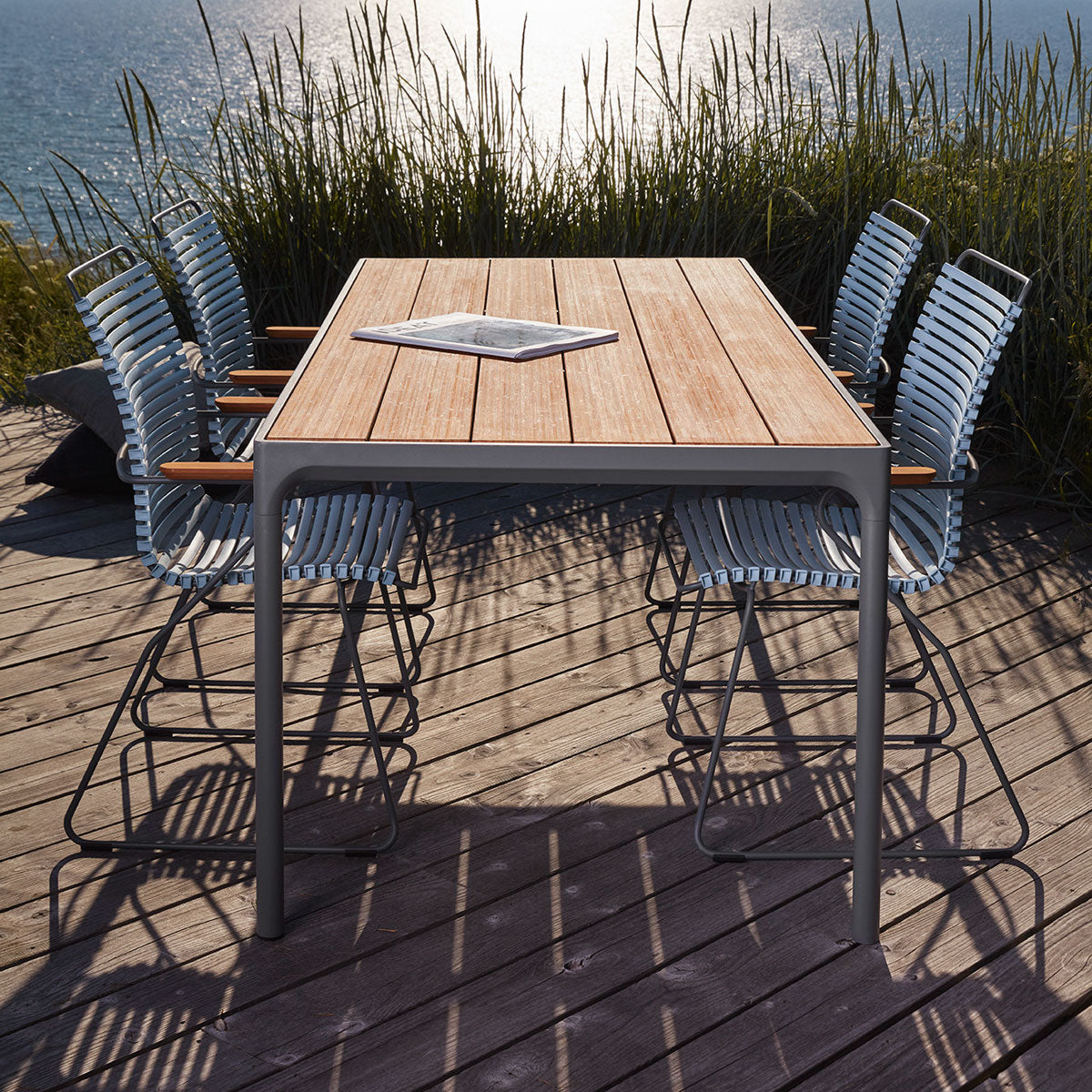 Four Outdoor Dining Counter Table by Houe, showing four outdoor dining counter table in live shot.