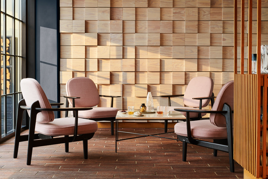 Fred Lounge Chair by Fritz Hansen, showing fred lounge chairs in live shot.