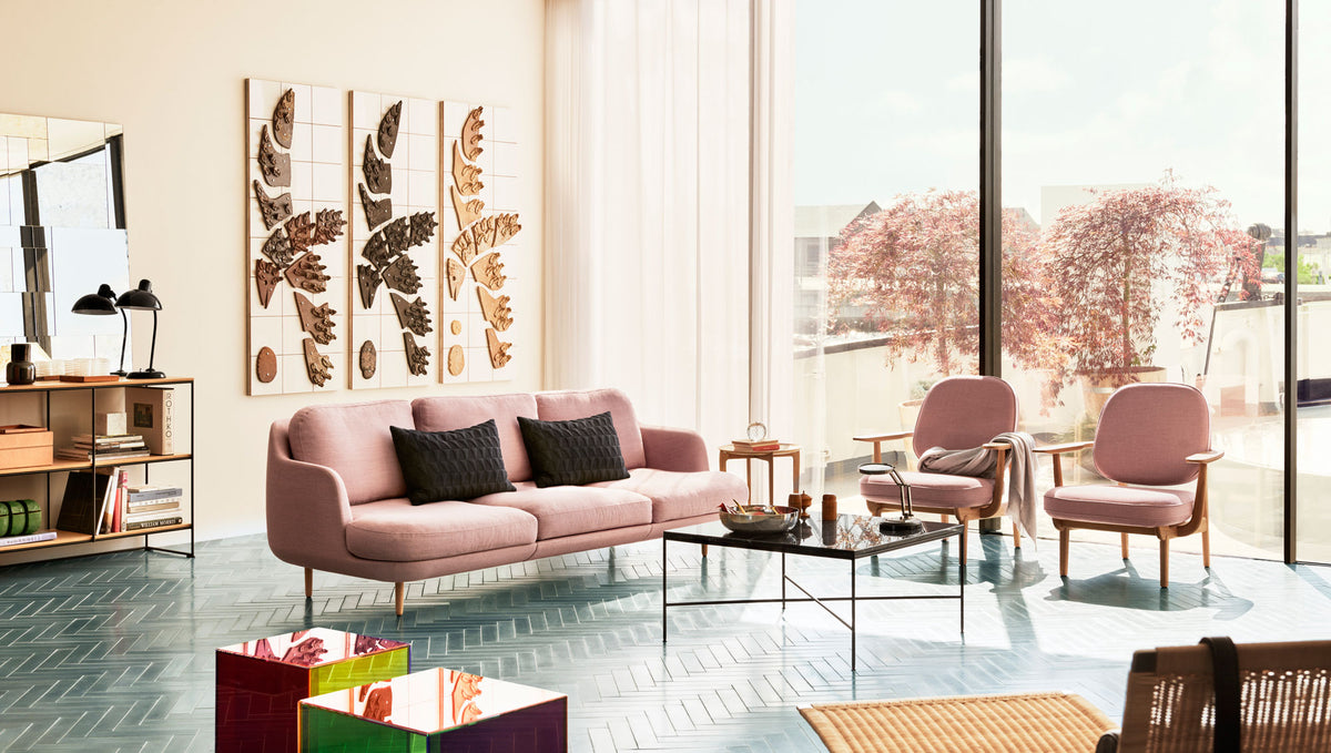 Fred Lounge Chair by Fritz Hansen, showing fred lounge chairs in live shot.