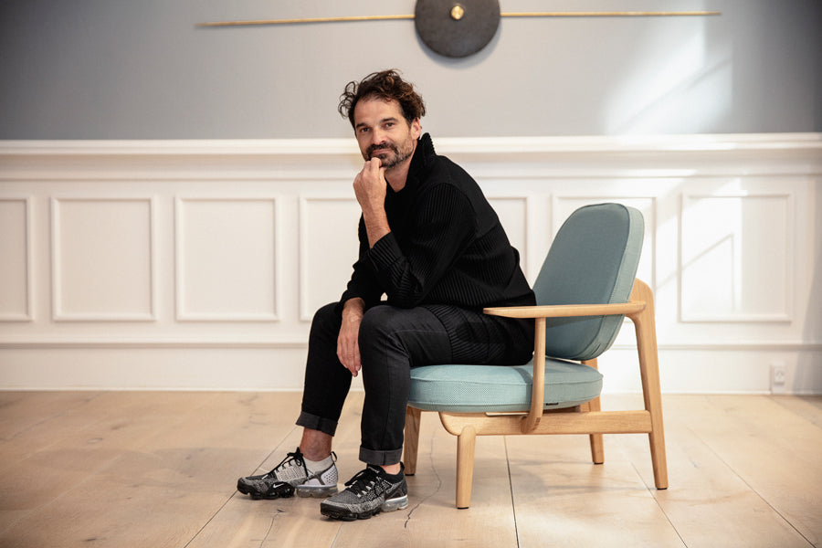 Fred Lounge Chair by Fritz Hansen, showing fred lounge chair in live shot.