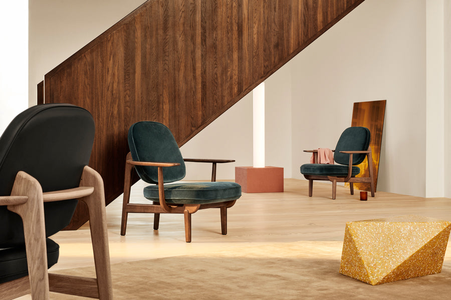 Fred Lounge Chair by Fritz Hansen, showing fred lounge chairs in live shot.