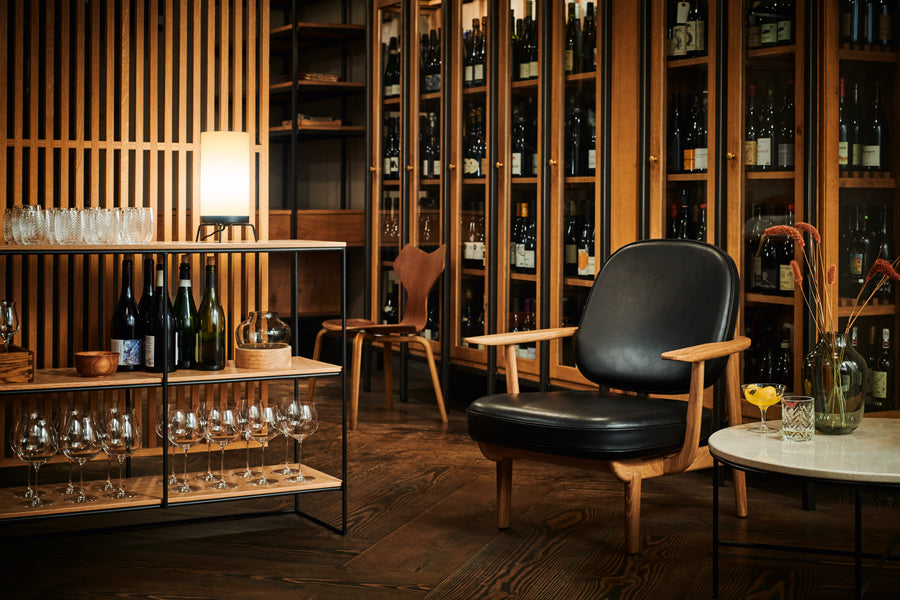Fred Lounge Chair by Fritz Hansen, showing fred lounge chair in live shot.