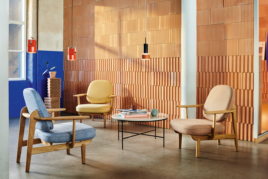 Fred Lounge Chair by Fritz Hansen, showing fred lounge chairs in live shot.