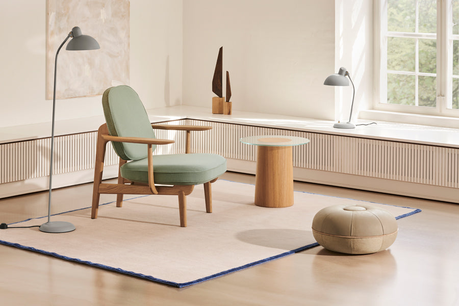 Fred Lounge Chair by Fritz Hansen, showing fred lounge chair in live shot.