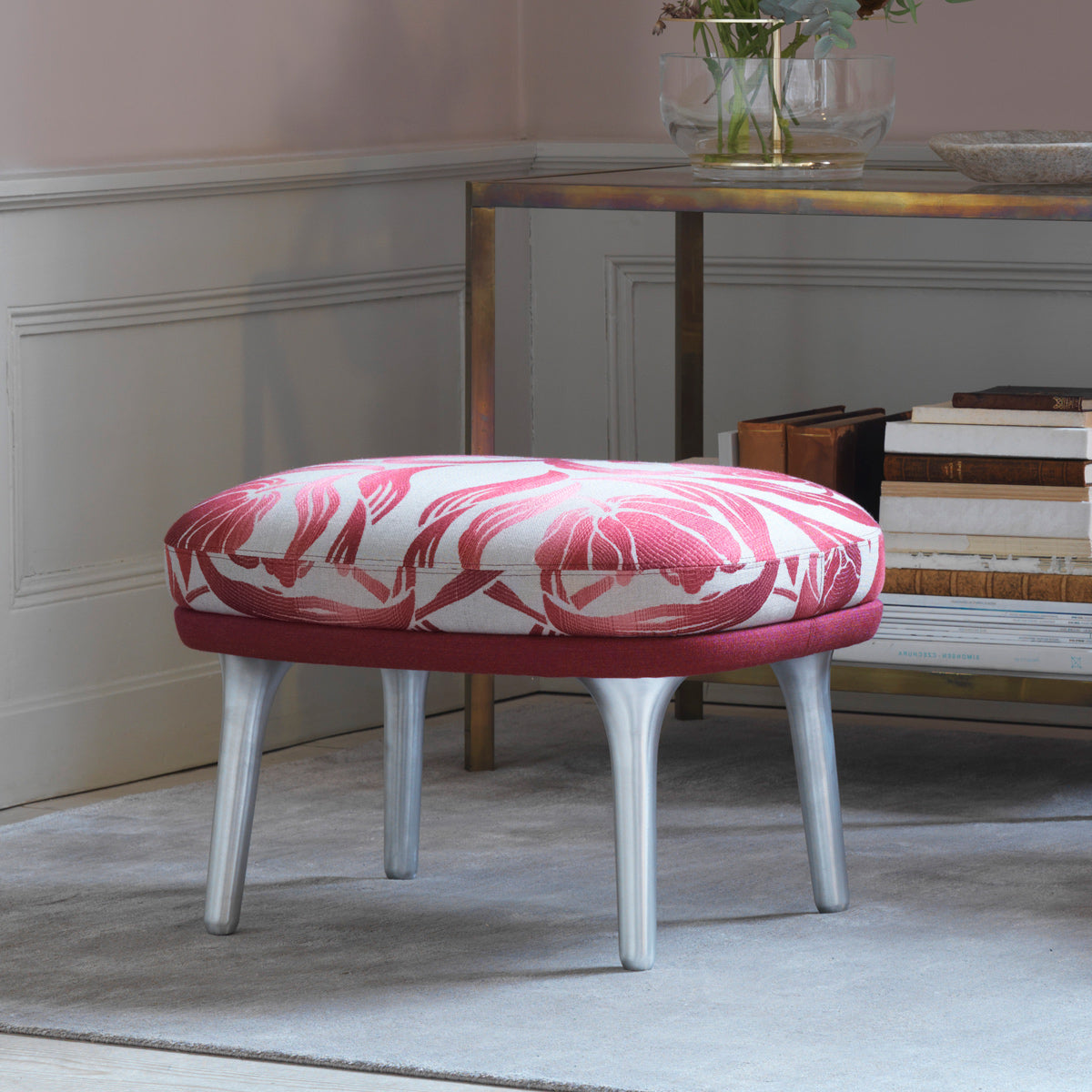 Fri Footstool by Fritz Hansen, showing fri footstool in live shot.