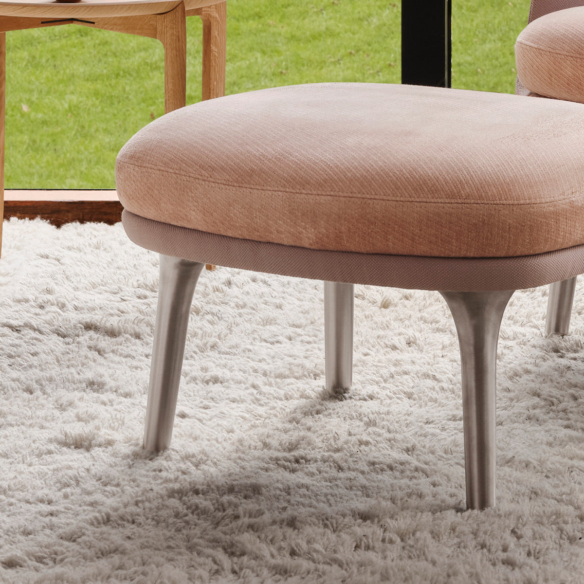 Fri Footstool by Fritz Hansen, showing fri footstool in live shot.