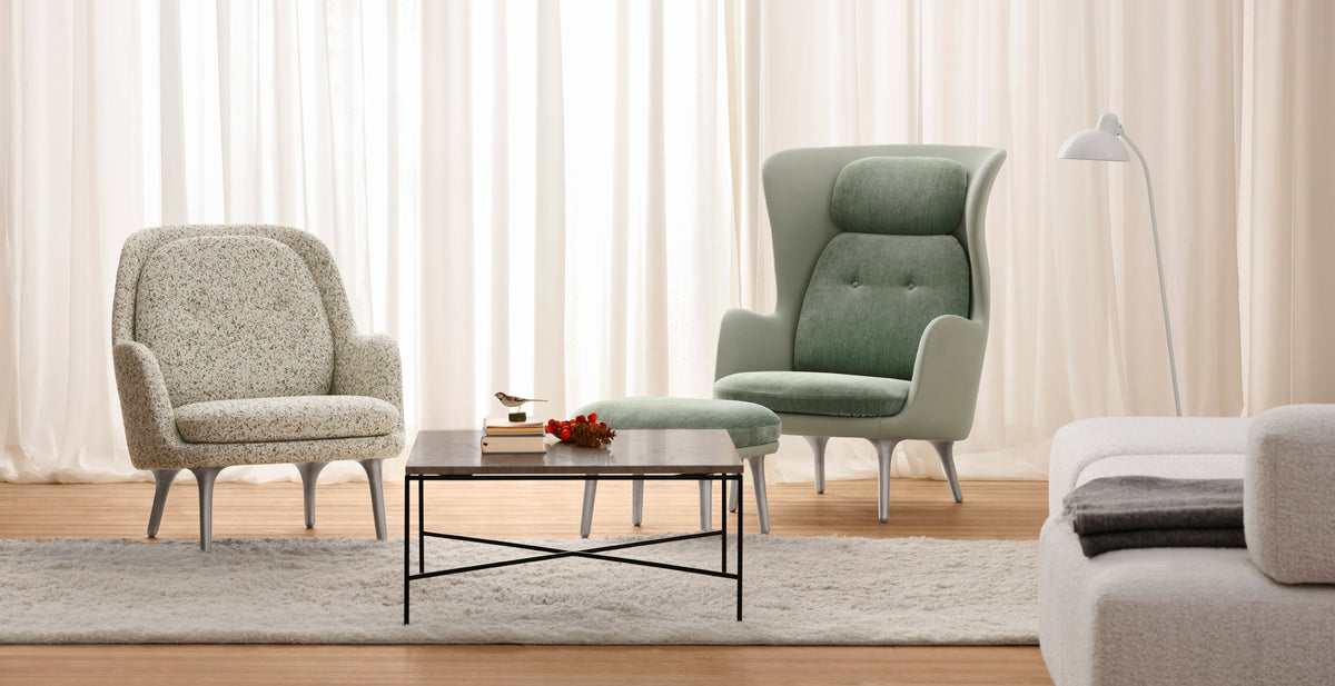 Fri Lounge Chair by Fritz Hansen, showing fri lounge chair in live shot.