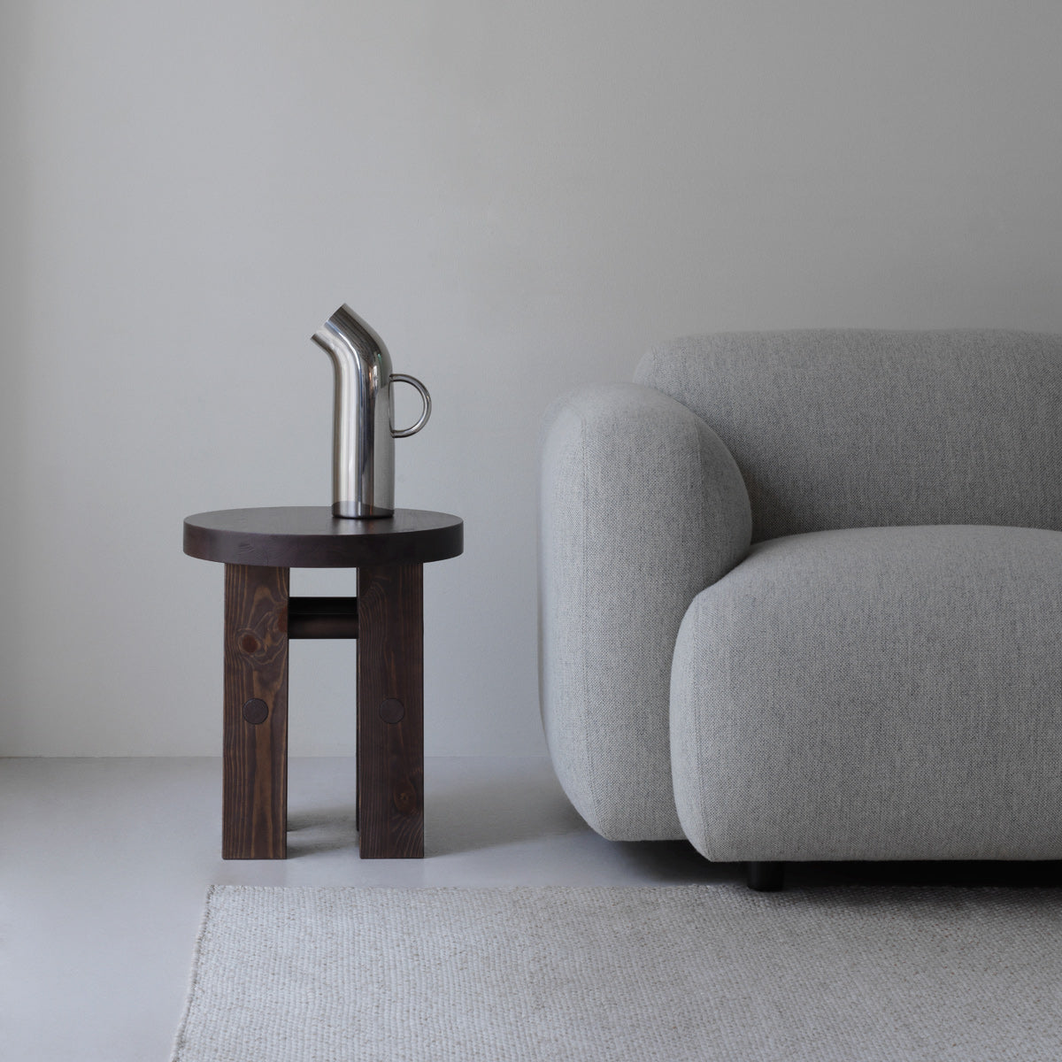 Fyr Stool by Normann Copenhagen, showing fyr stool in live shot.
