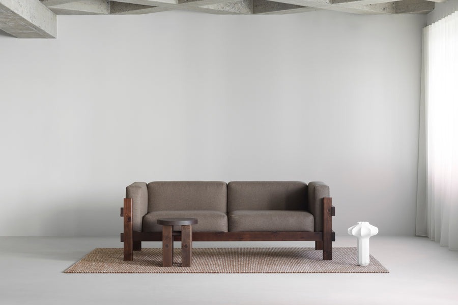 Fyr Stool by Normann Copenhagen, showing fyr stool in live shot.