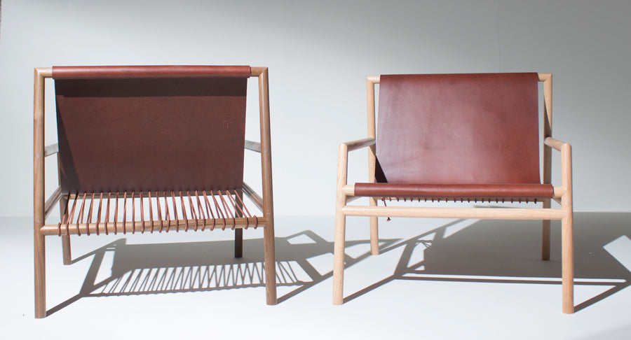 Gallagher Lounge Chair by Tronk Design, showing gallagher lounge chairs in live shot.