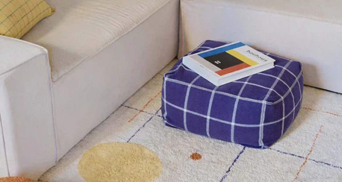 Geo Block Pouf by Lorena Canals, showing geo block pouf in live shot.