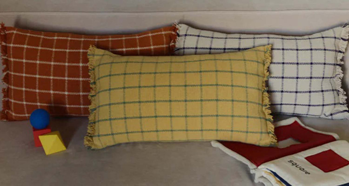 Geo Block Cushion by Lorena Canals, showing geo block cushion in live shot.