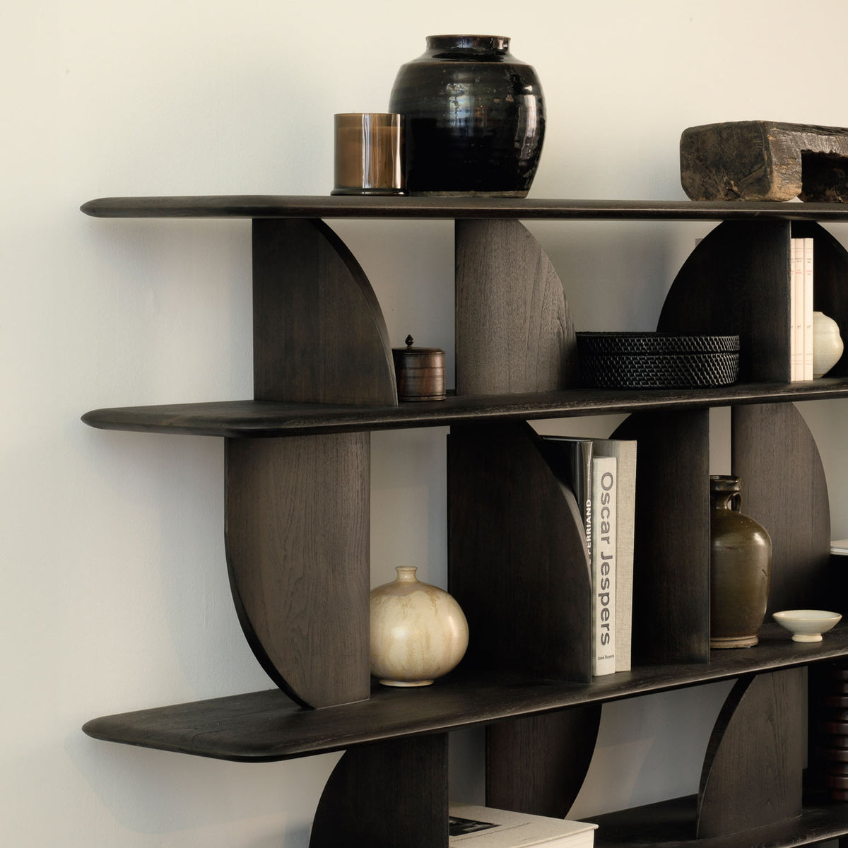 Geometric Rack Dark Teak by Ethnicraft, showing closeup view of geometric rack dark teak in live shot.